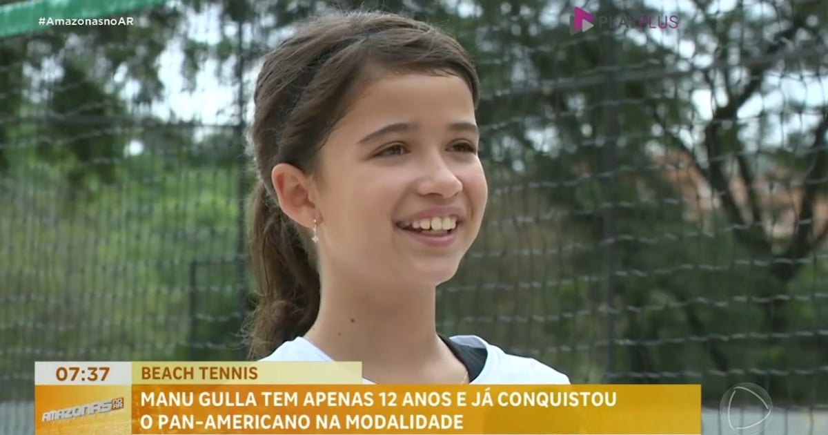 Manu Gulla, jovem atleta de beach tennis, celebrando sua vitória no Pan-Americano.